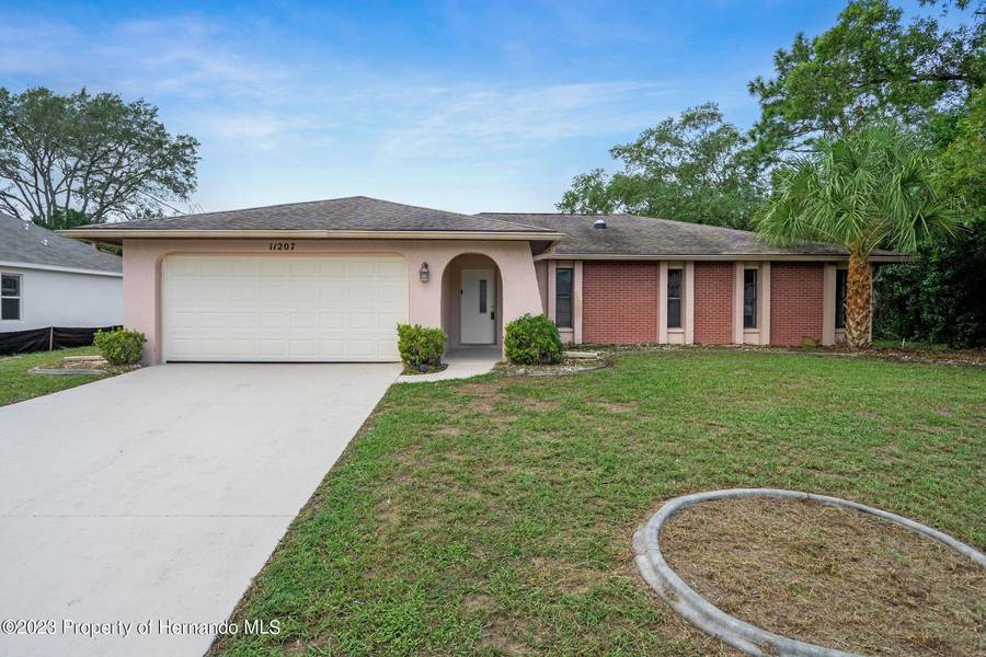 11207 Murraysville Drive, Spring Hill, FL 34609