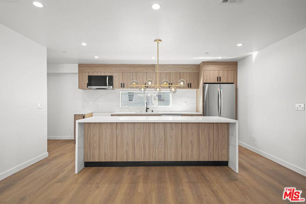 Los Angeles, CA 90038,819 N Mccadden PL #1/2