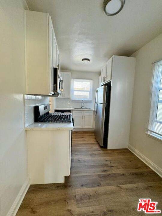Los Angeles, CA 90019,1511 12th AVE #3/4