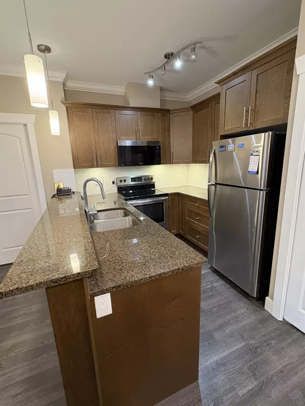 Surrey, BC V3W 1S7,8183 121a ST #409