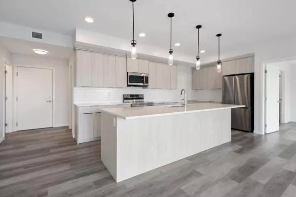 Calgary, AB T3K 2S1,360 Harvest Hills WAY NE #306