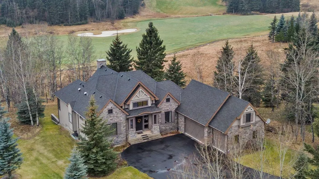 37 Hawk's Landing DR, Priddis Greens, AB T0L 1W0