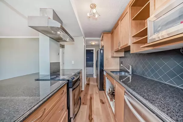 Calgary, AB T3C 0X6,1225 15 AVE SW #205