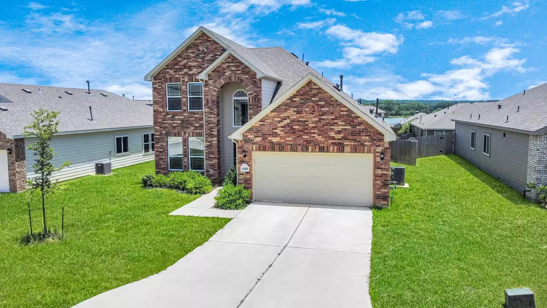 11408 Natalia LN, Willis, TX 77318