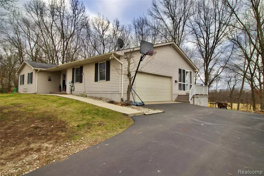 1405 TRACILEE Drive, Howell, MI 48843 7809