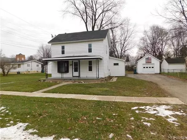 215 S MAPLE ST, Fowlerville, MI 48836