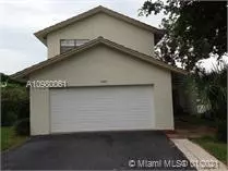 1297 Spring Cir Dr, Coral Springs, FL 33071